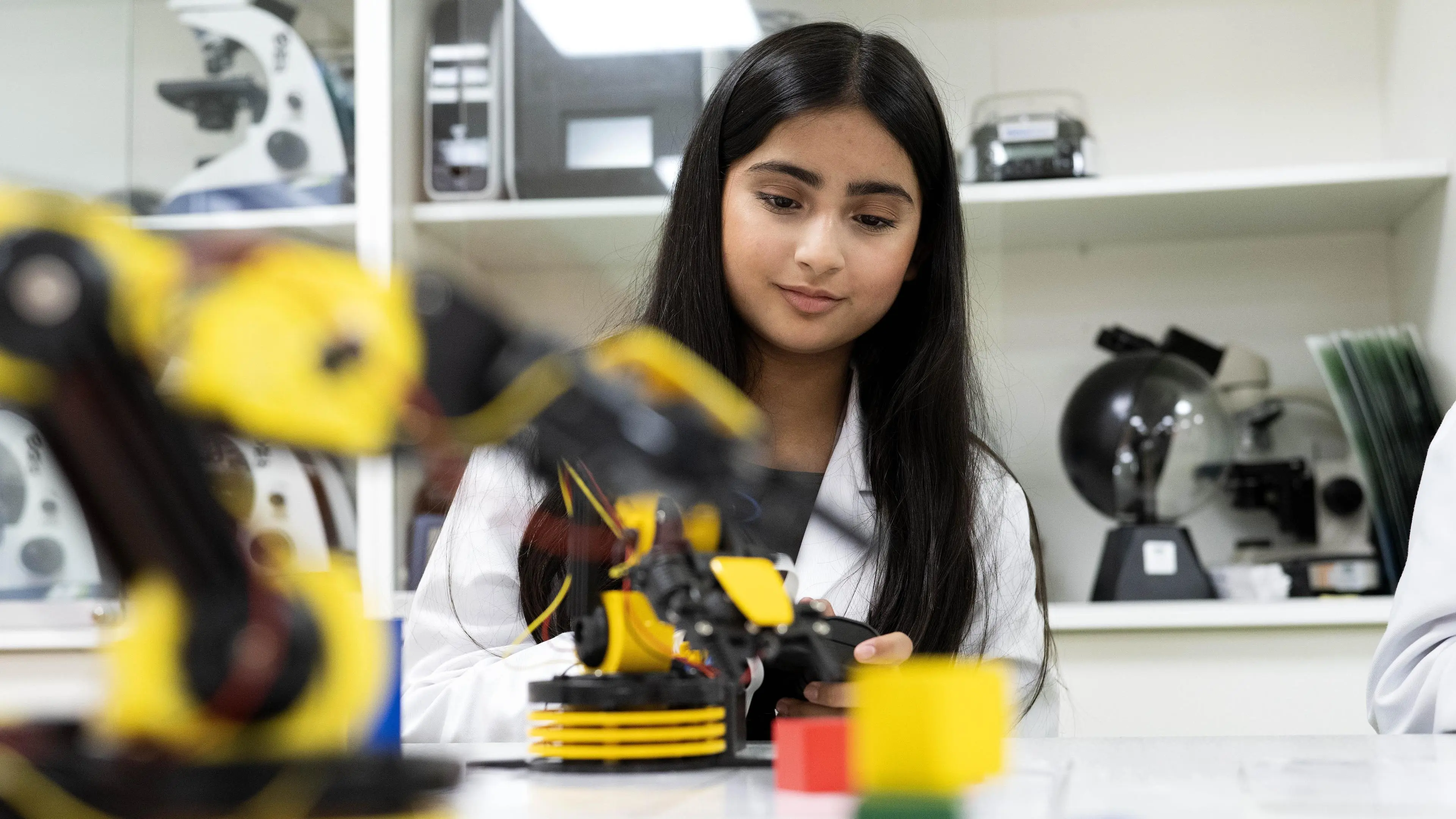 Young scientist with an experiment.