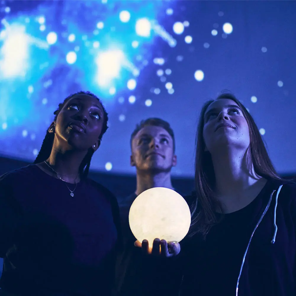 Students looking at sky