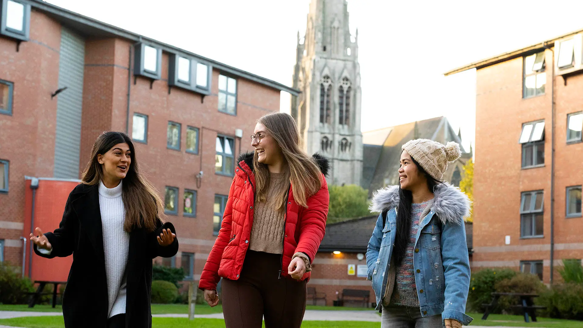 students walking outside roeburn hall