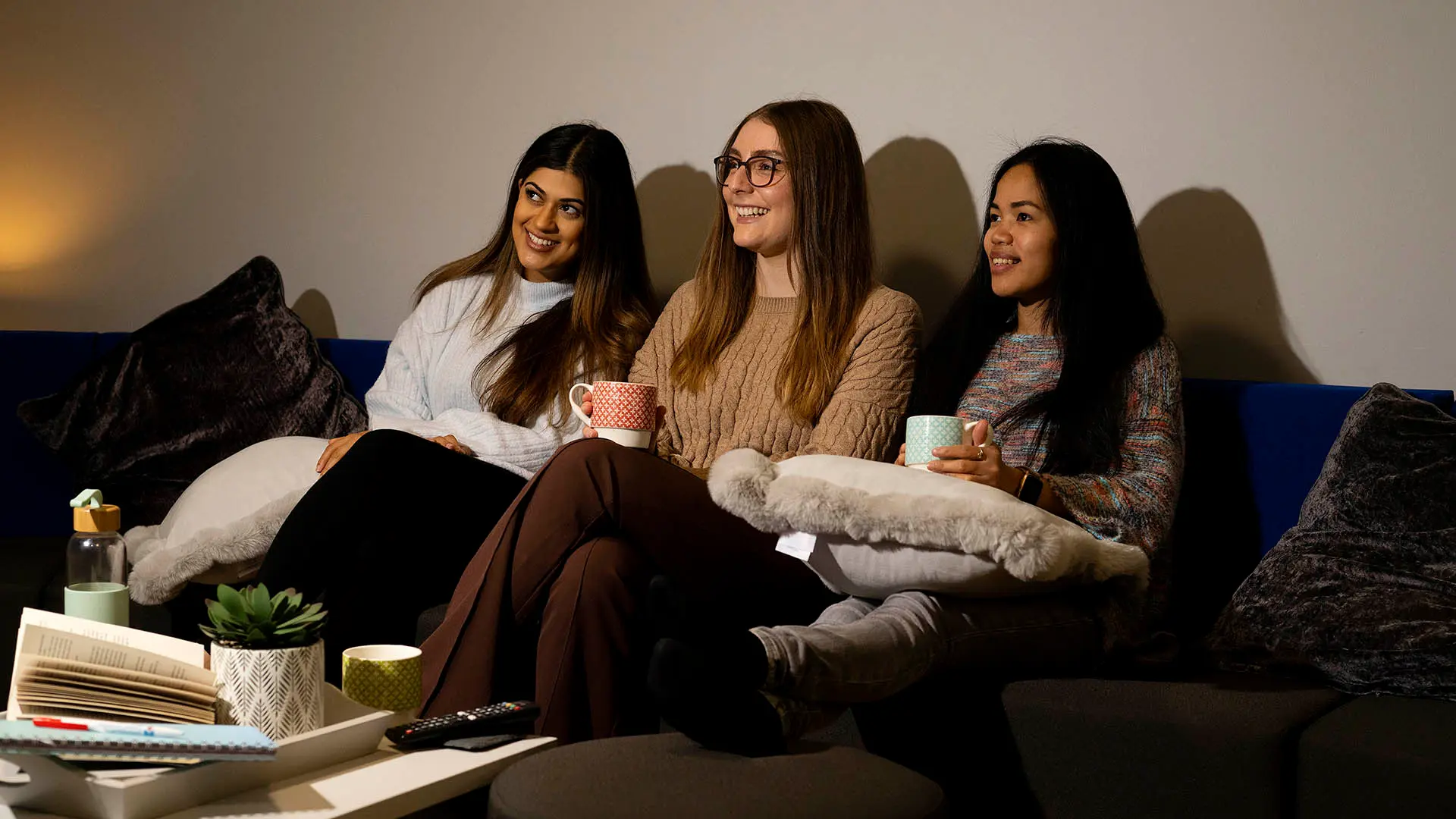 students sat on sofas in roeburn hall