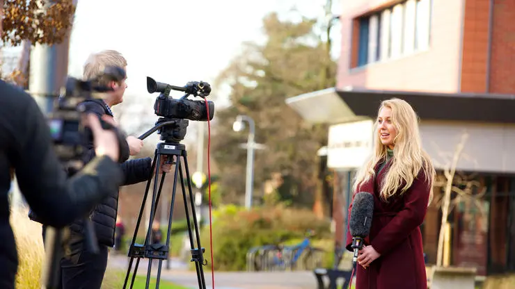 Journalism Students filming and reporting