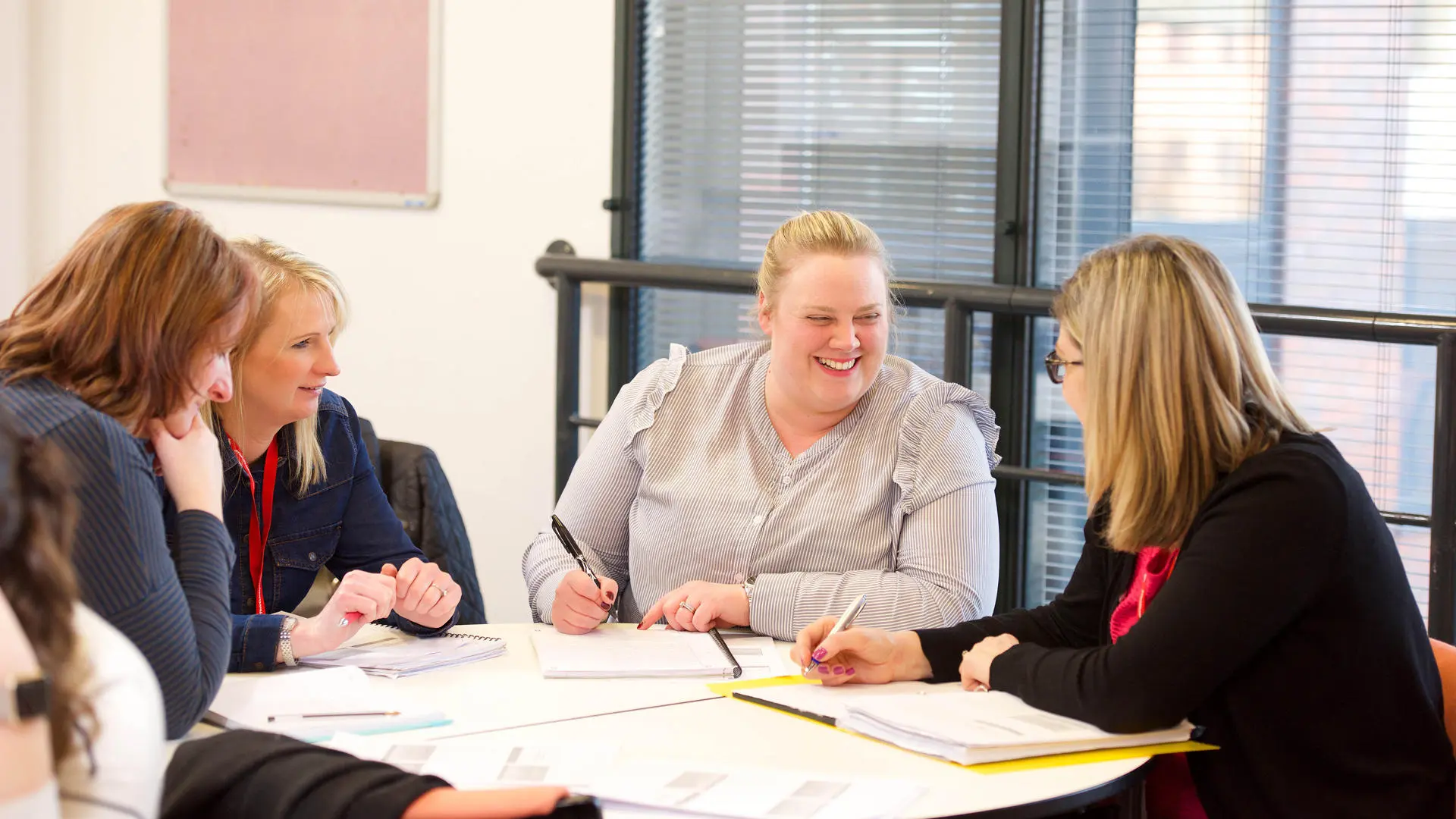 Group of businesswomen engaged in a group discussion