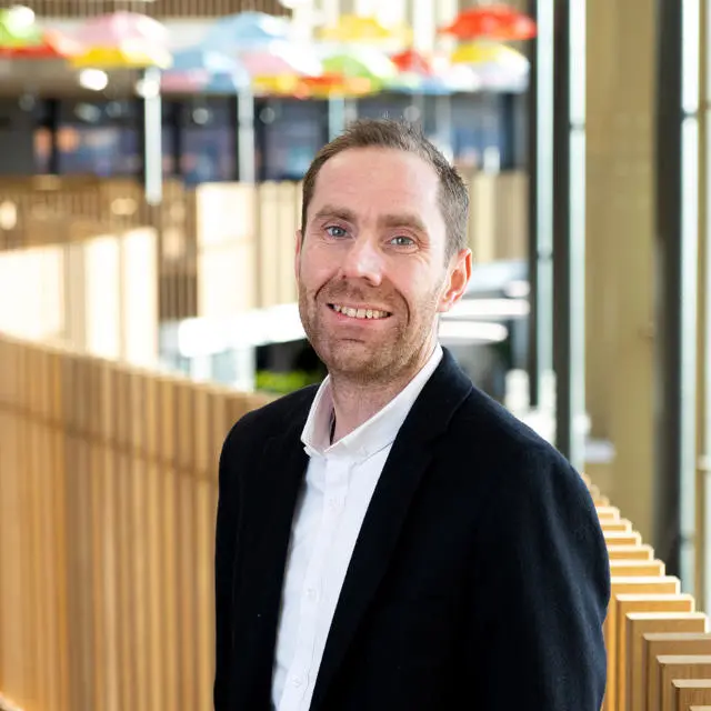 Headshot of Dr Adrian Wright