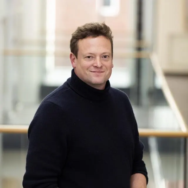 Headshot of Professor Duncan Sayer