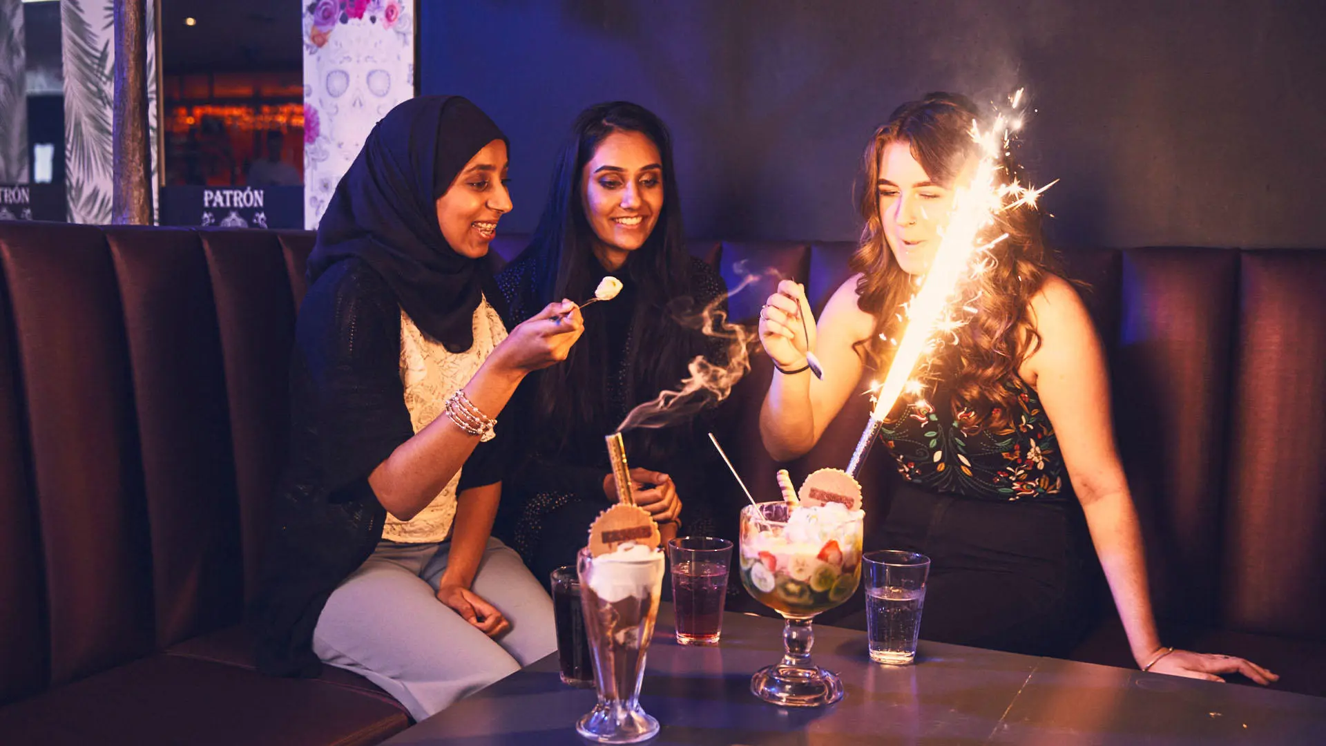 Students enjoying drinks and desserts in Kaspas, Preston