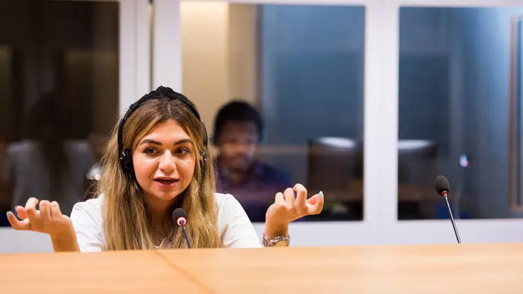 TESOL students in the interpreting booth