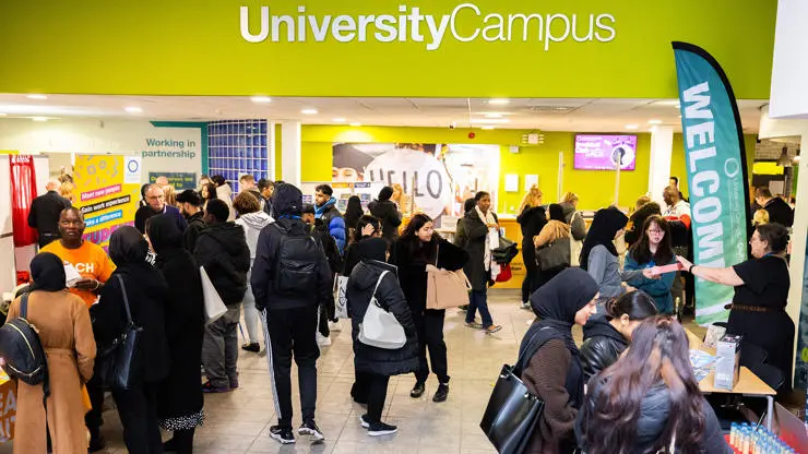 New students experiencing the freshers fair at University Campus Oldham.
