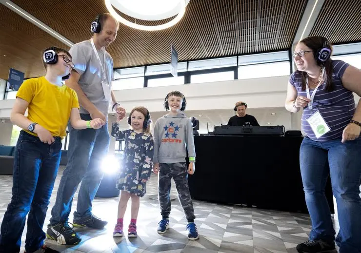 Reuben, Paul, Saffron, Logan and Amy Bishop-Powell dancing at the Silent Disco